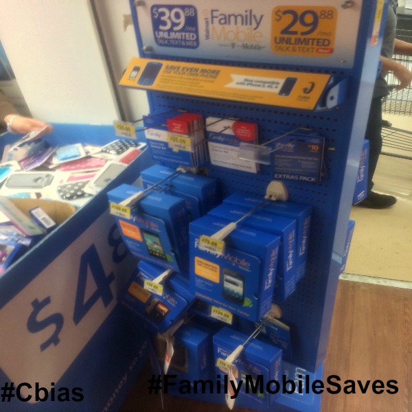 The stand that has phones, starter kits, sim cards and extras packs. #cbias #shop #FamilyMobileSaves