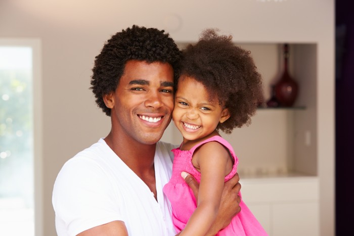 Black Dad with Daughter
