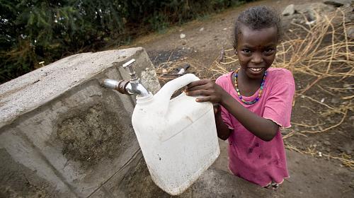 Girl Getting Water