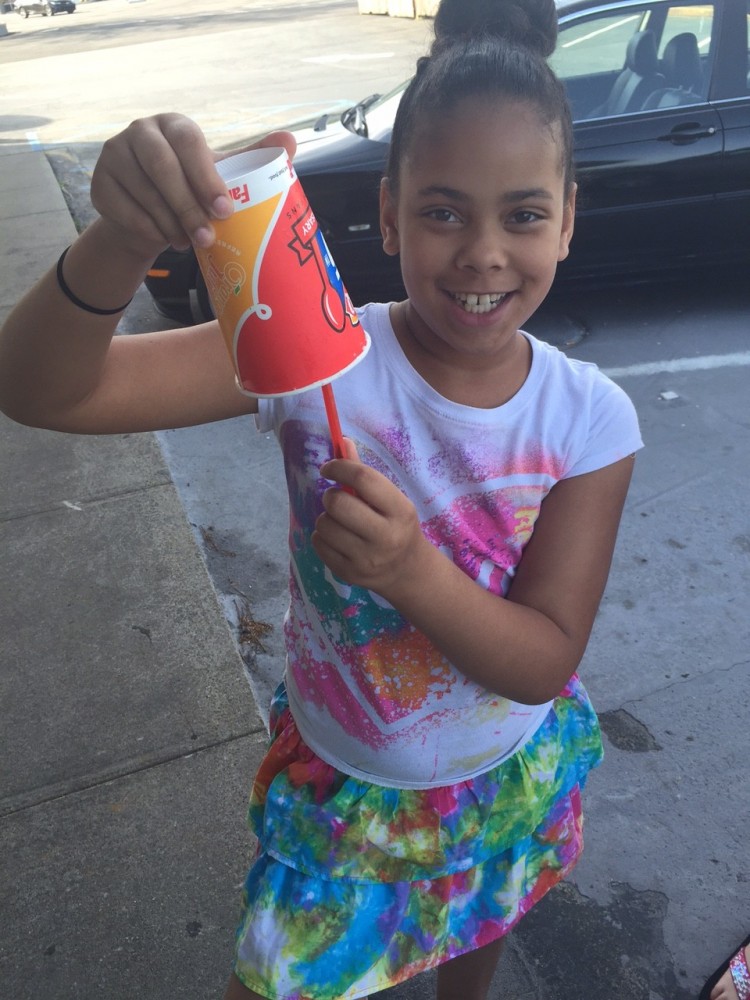 Daughter Holding Blizzard from Dairy Queen #GetUpsideDown
